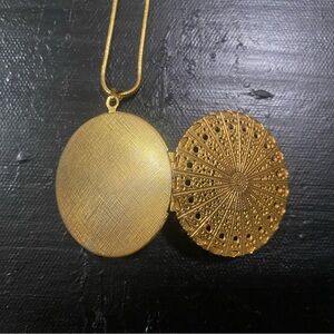 Vintage gold locket with snake chain